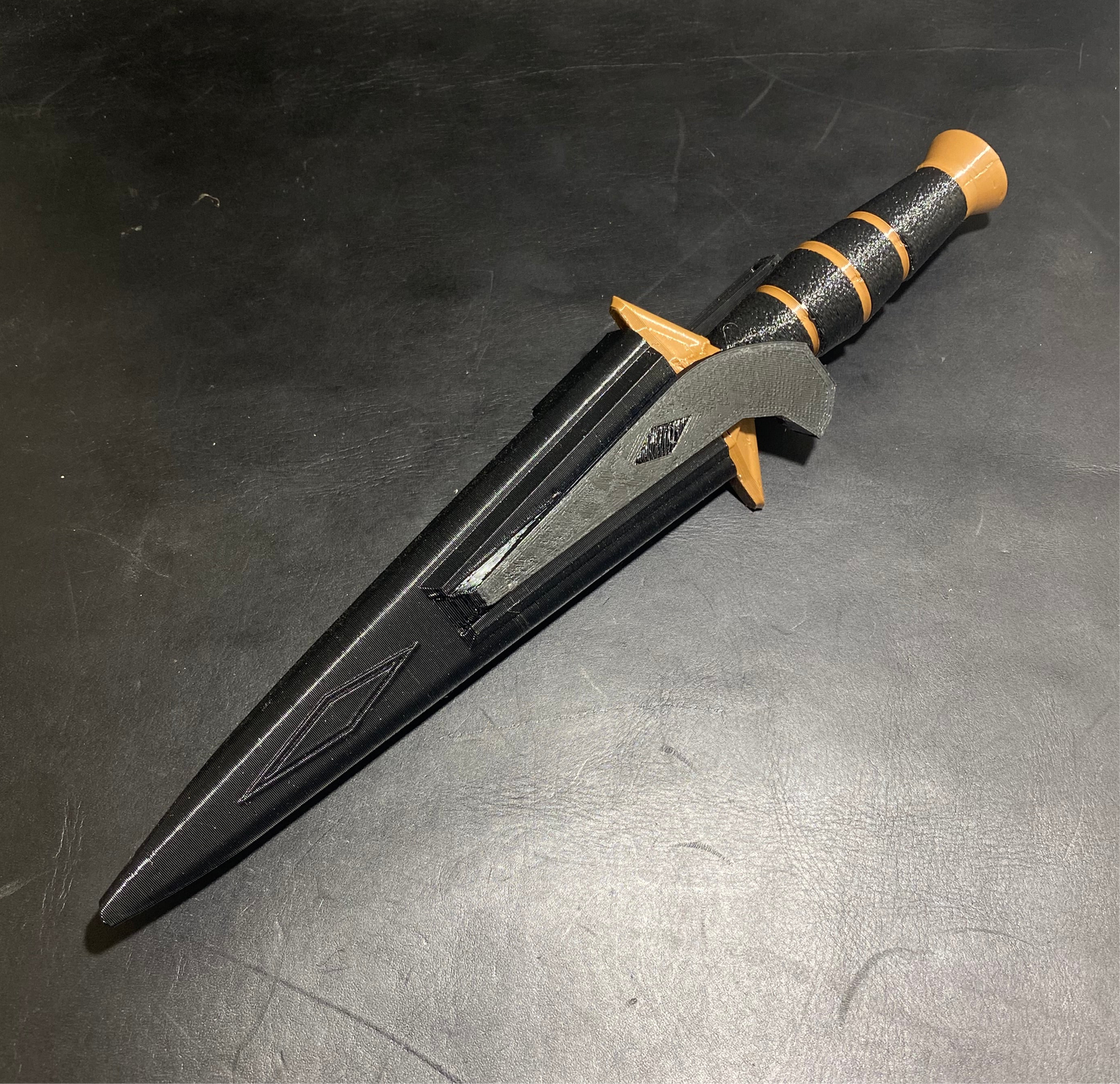 Reverse brown marble/black claw