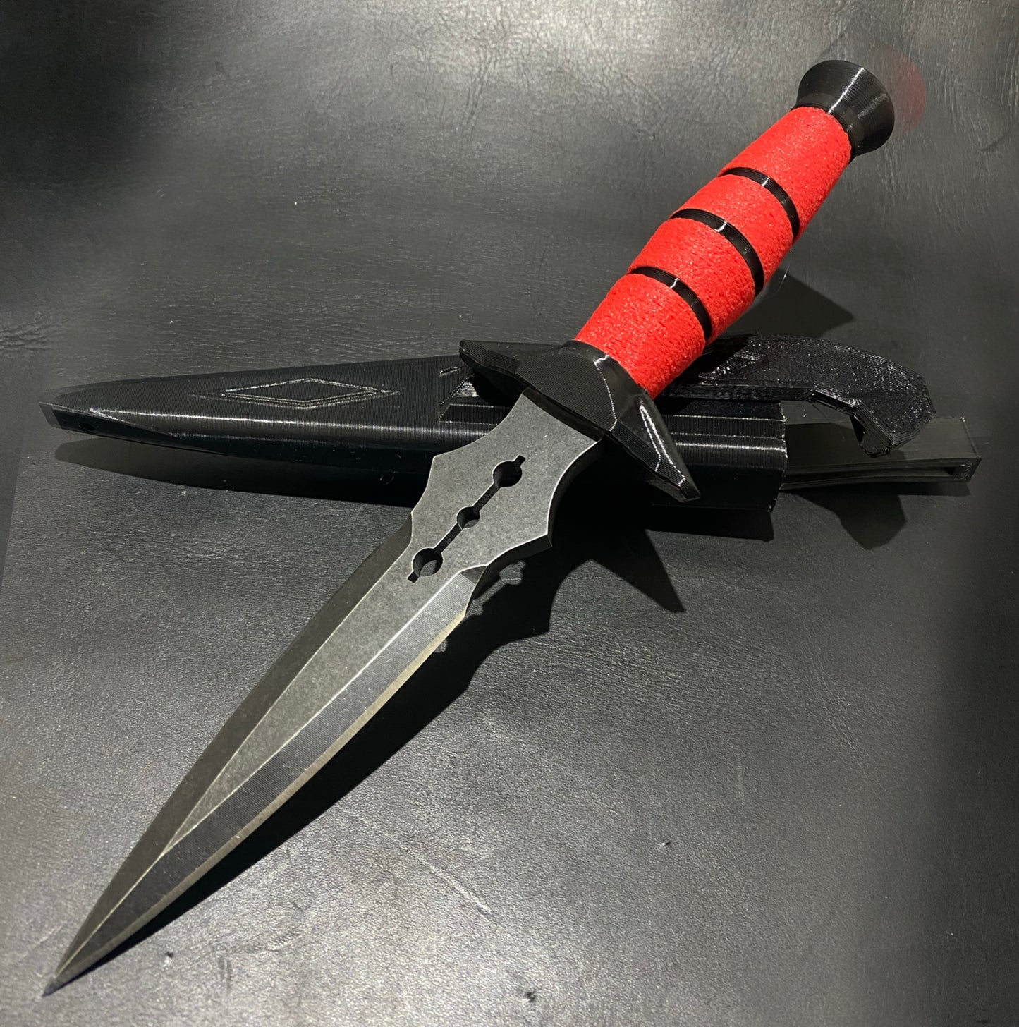 Red marble, black claw, dart knife